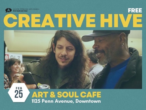 Two smiling men networking inside a busy event space. Creative hive on February 25 at Art & Soul Cafe