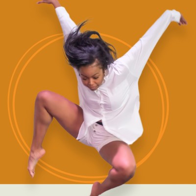 A person dances in the air in a dance pose in front of a bright orange background